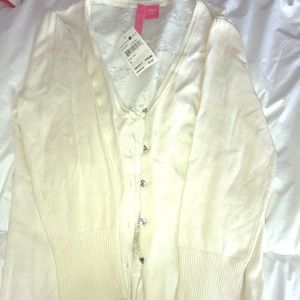 Cream colored cardigan with lace back